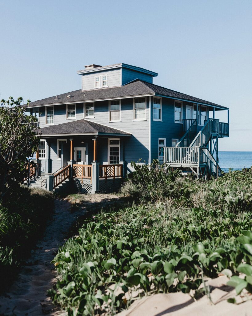 Waterfront property with a strip of natural vegetation sloping down to the water in the Laurentians